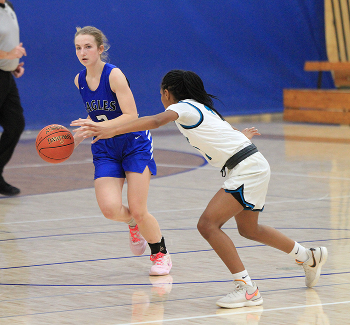 Rosemary Laudenbach tries to get past a Thunderbird defender during a